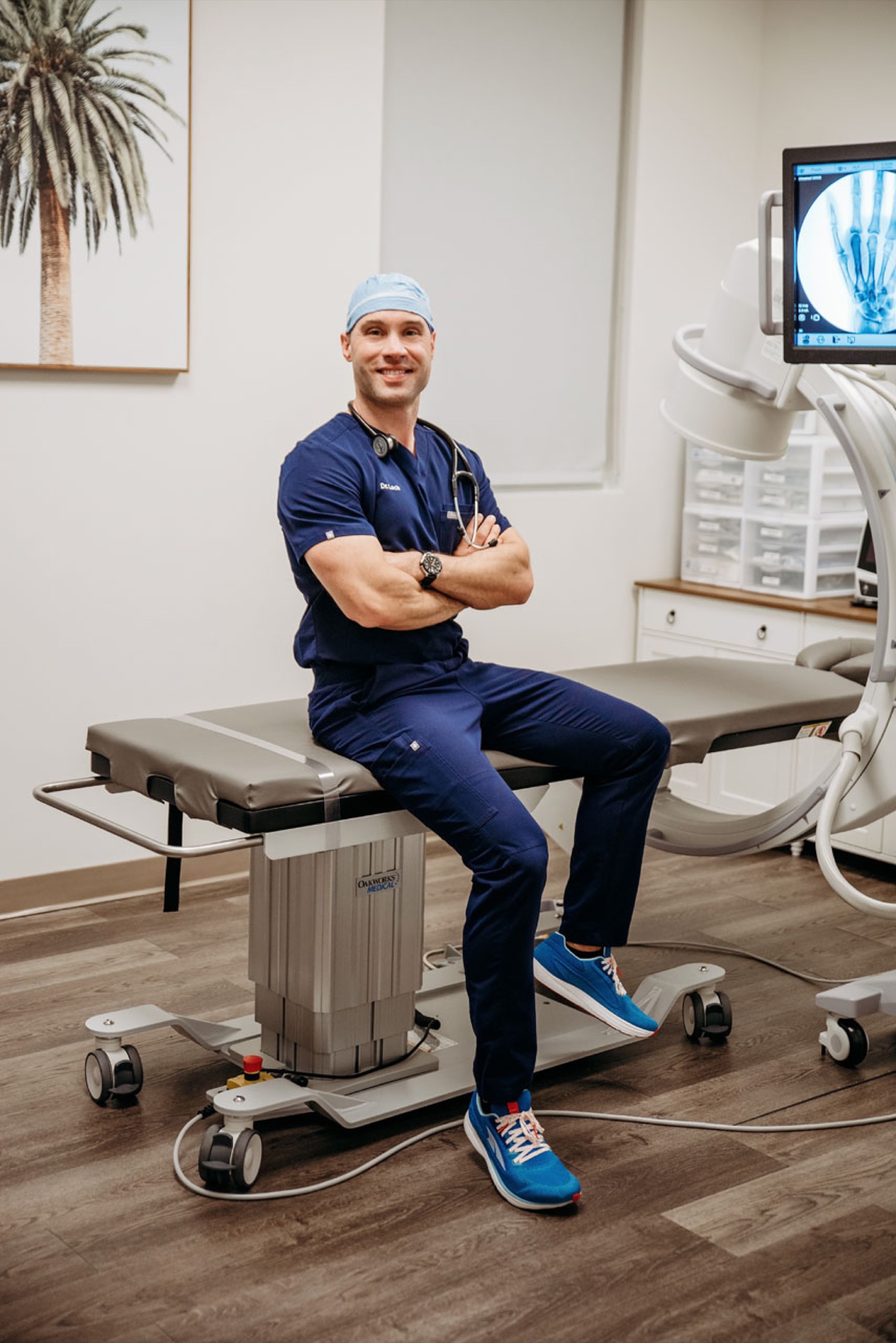 The procedure suite with the C-arm fluoroscopy unit